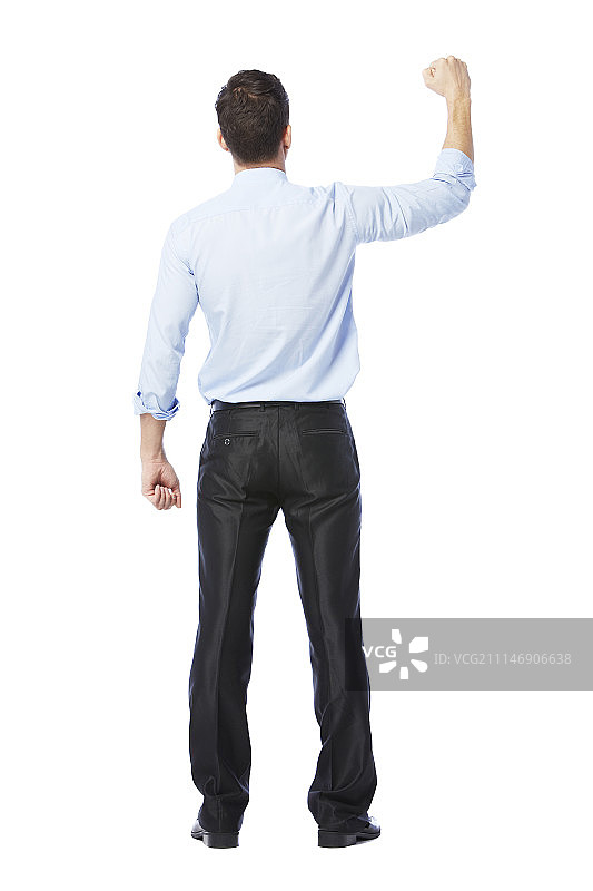 男人穿着西装站立，做手势的影棚照片图片素材