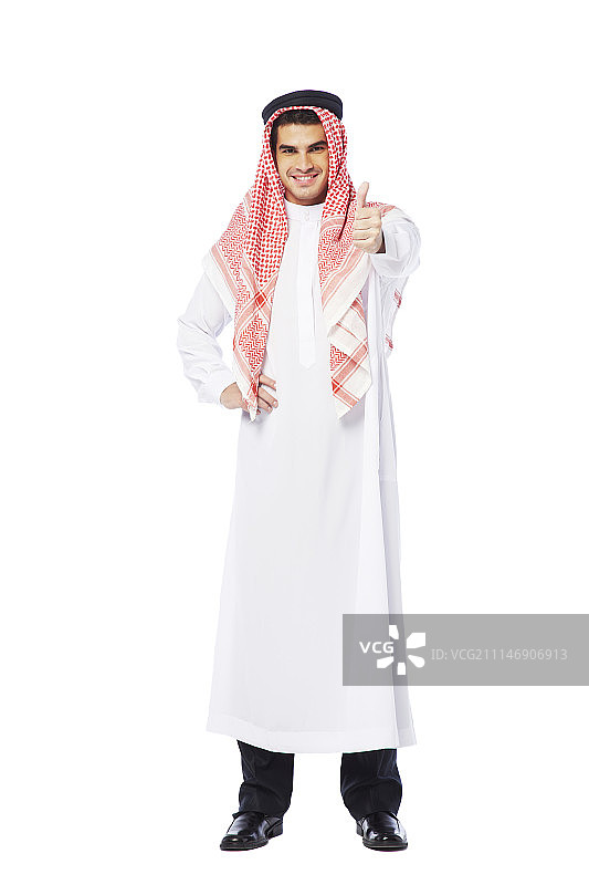 身穿坎杜拉长袍，手势的男士（影棚拍摄）图片素材