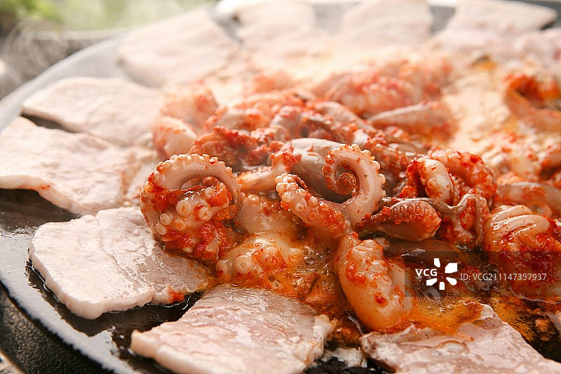 香辣炒小章鱼五花肉图片素材