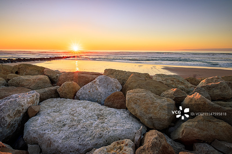 拉卡诺海滩日落图片素材