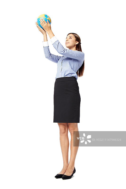 手持地球仪的商务女性摄影图片素材