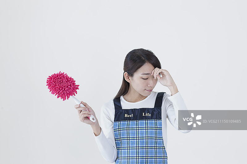 家庭主妇烦恼头痛图片素材