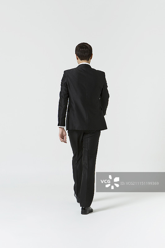 商人走路摄影图片素材