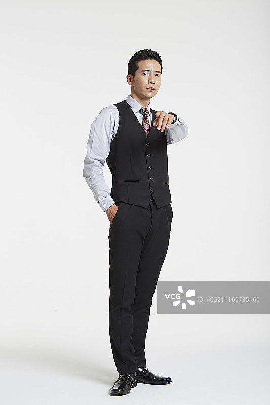 西装男士召唤手势摄影图片素材