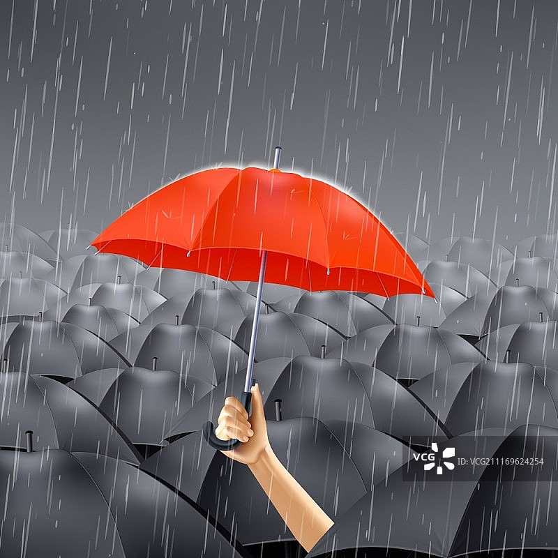 在黑色雨伞下撑红色雨伞图片素材