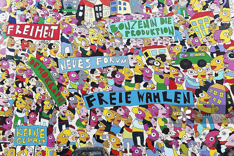 德国萨克森州莱比锡布吕拉卡登的德国统一墙绘展示图片素材