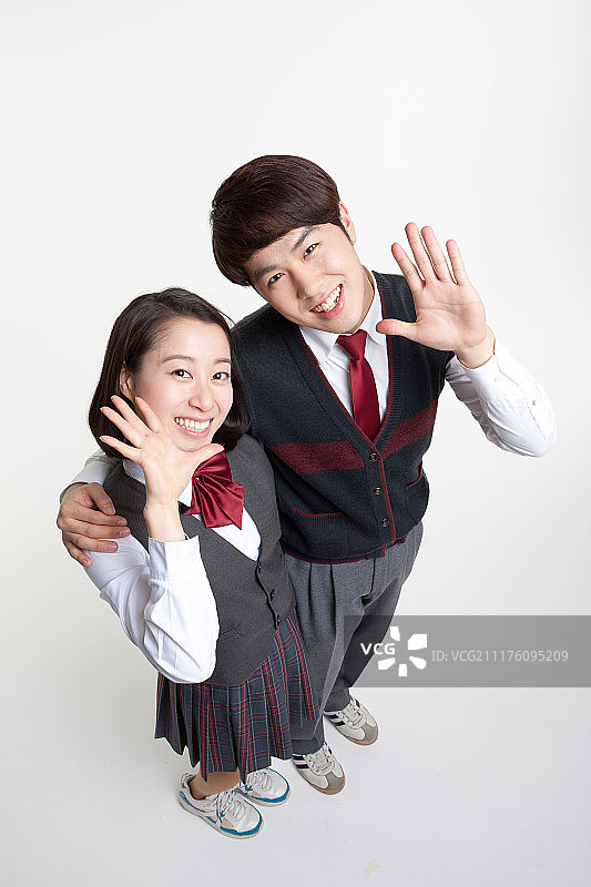 可爱学生情侣图片素材