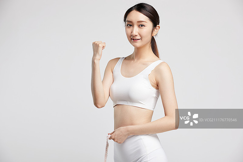 测量的年轻女生图片素材