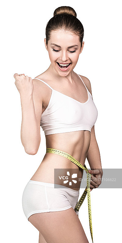 拿着卷尺的美丽女人图片素材