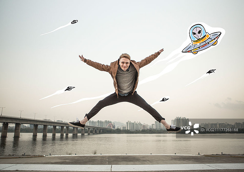 UFO插图与跳跃的人的合成图像图片素材