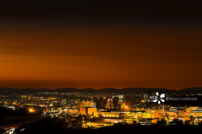 日落时分城市建筑灯光俯视图图片素材