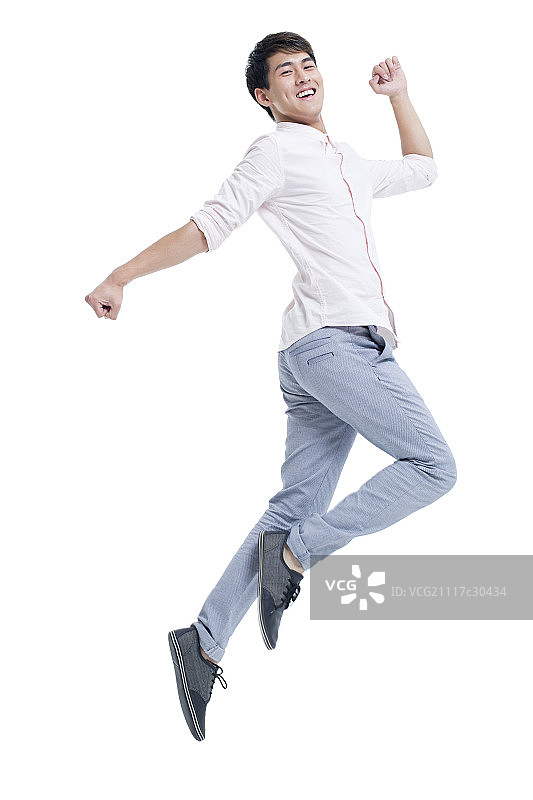 年轻男子跳跃图片素材