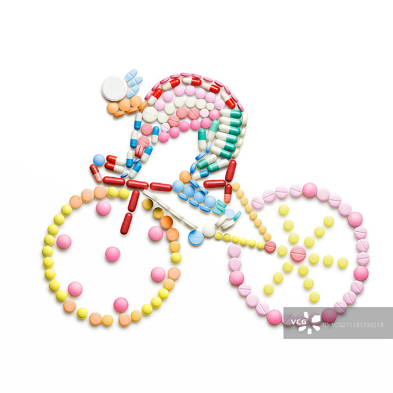 自行车赛车手形状的兴奋剂药物和药丸图片素材