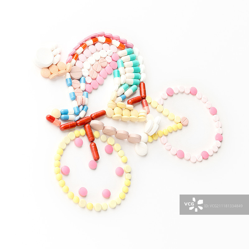 自行车赛车手形状的兴奋剂药物和药丸图片素材