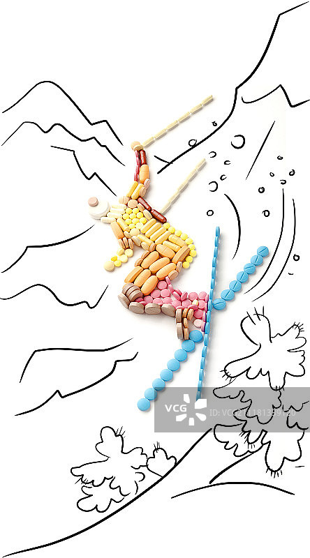 服用兴奋剂药丸和药物，滑雪运动员从悬崖上跳下图片素材