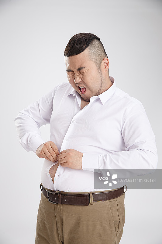 商务胖男人穿衣服图片素材