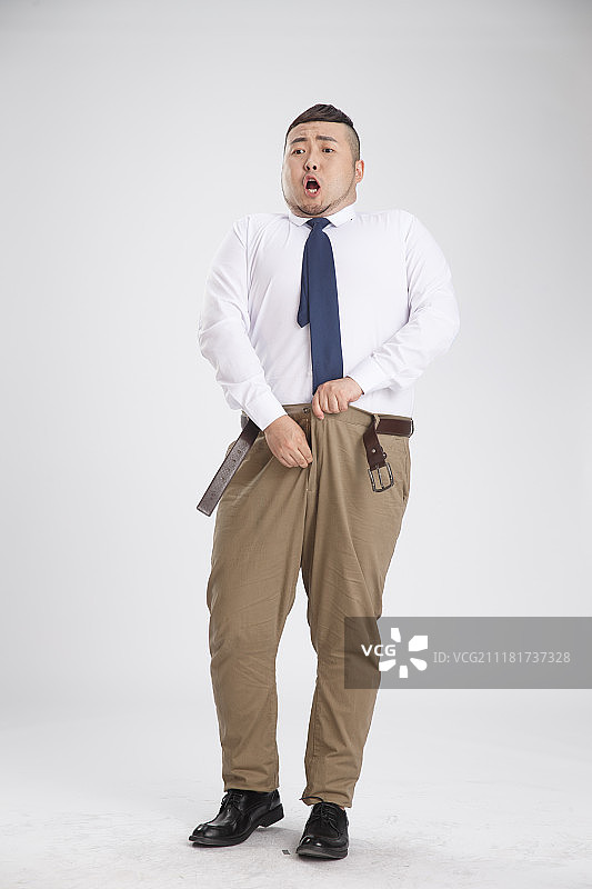商务胖男人穿衣服图片素材