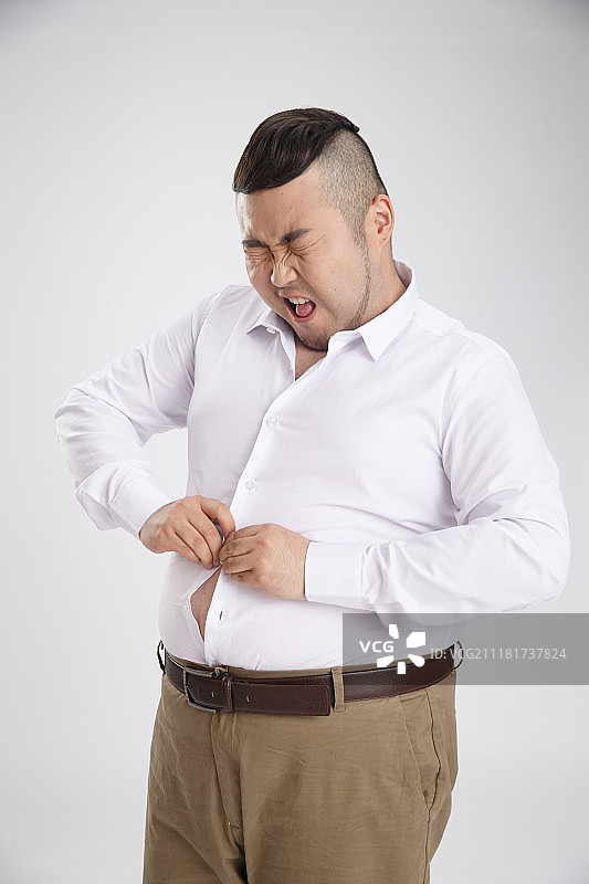 商务胖男人穿衣服图片素材