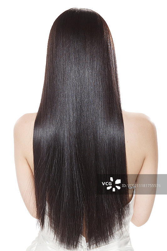 青年女人亮丽丝缎般的头发图片素材