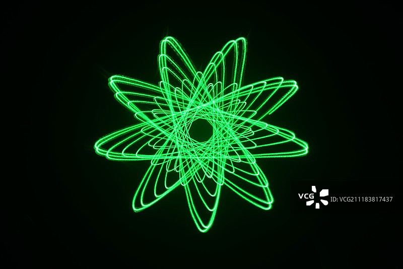 绿色激光光绘物理图案黑色背景棚拍创意图片素材