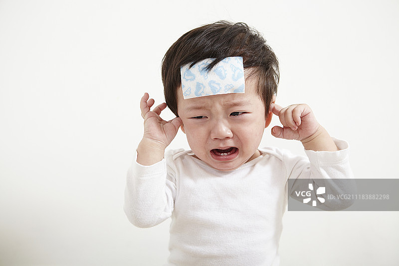 婴儿疼痛哭泣的摄影图片素材