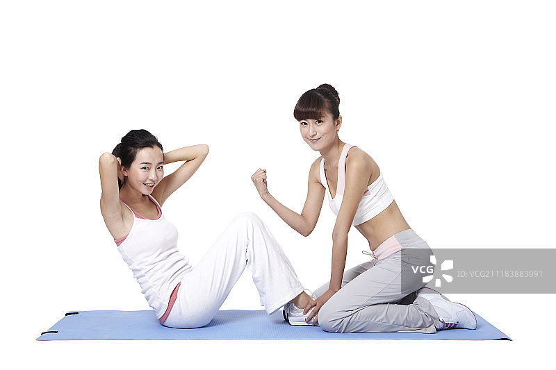 教练指导女子运动服装锻炼摄影图片素材