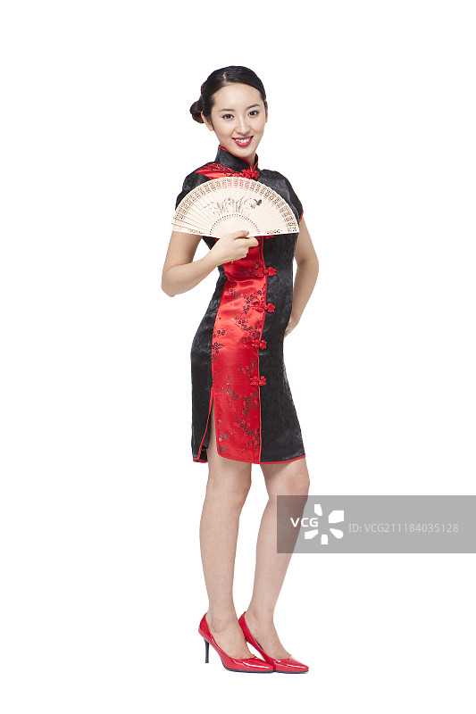 身穿中国传统服饰，手持道具的女子摄影图片素材