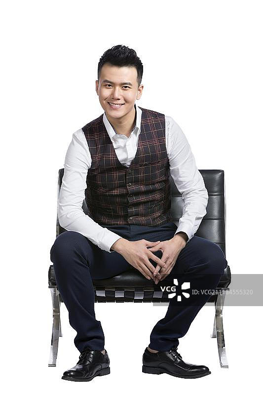 坐在椅子上的商务男士图片素材