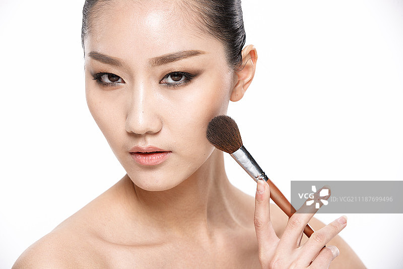 年轻女人化妆图片素材