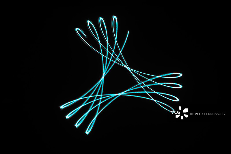 绿色激光光绘物理图案黑色背景棚拍创意图片素材