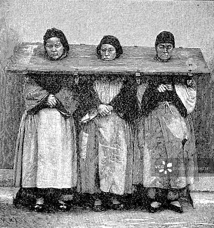 1870年中国对女犯的枷刑，木版画，中国，亚洲图片素材