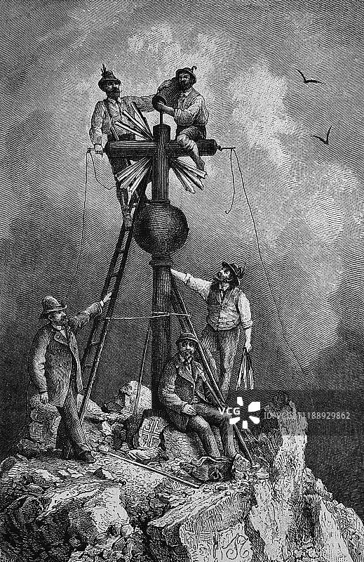 德奥阿尔卑斯俱乐部成员在楚格峰顶竖立十字架，木刻，历史雕刻，1882年图片素材