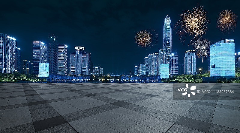 焰火下的深圳CBD摩天大楼夜景和地面光效果图片素材