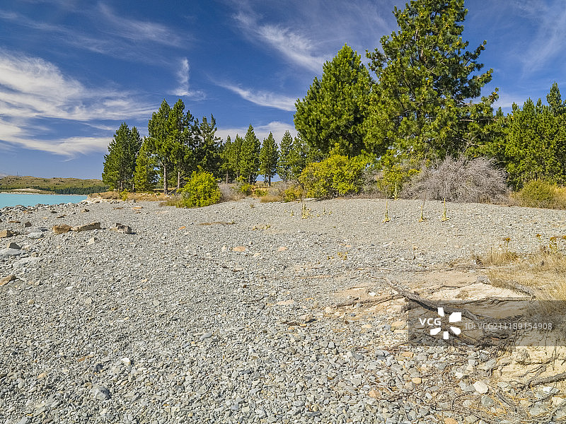 新西兰石滩大海山脉背景板图片素材