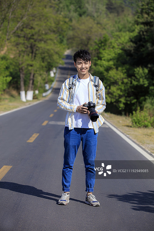 摄影的年轻男性图片素材