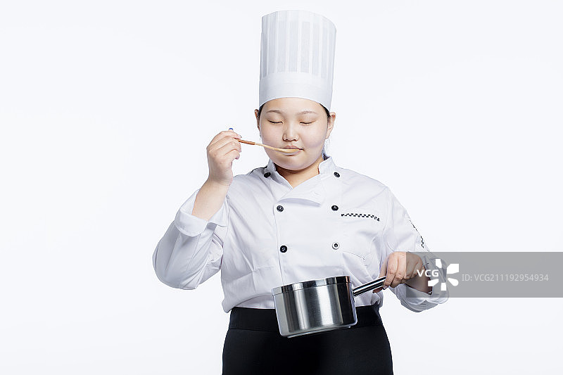 女厨师品尝味道图片素材