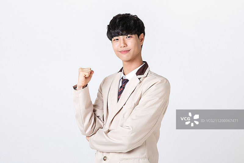 在白色背景下欢呼的高中生图片素材