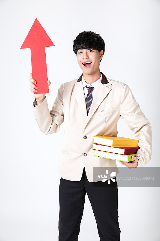 白色背景下的男学生学习素材图片素材