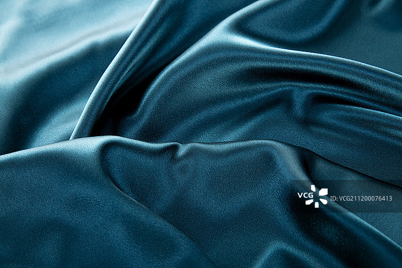 蓝色曲线布料样品背景图片素材