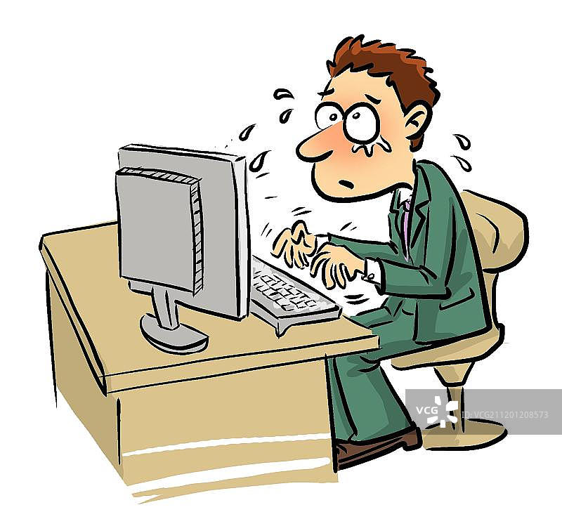 在电脑前紧张工作的男职员图片素材