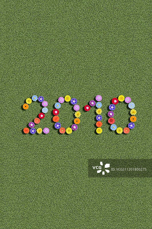 用鲜花书写的2010年图片素材