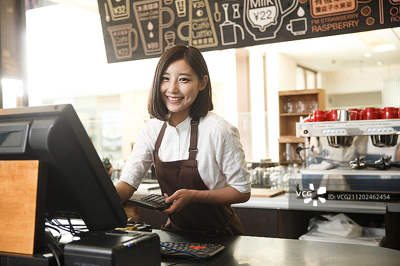 咖啡馆收银员图片素材