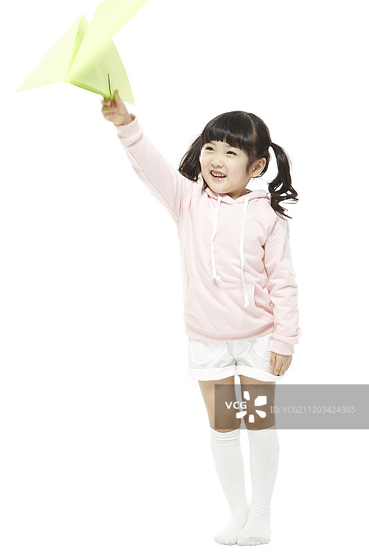 幼儿女孩手持纸飞机摄影图片素材