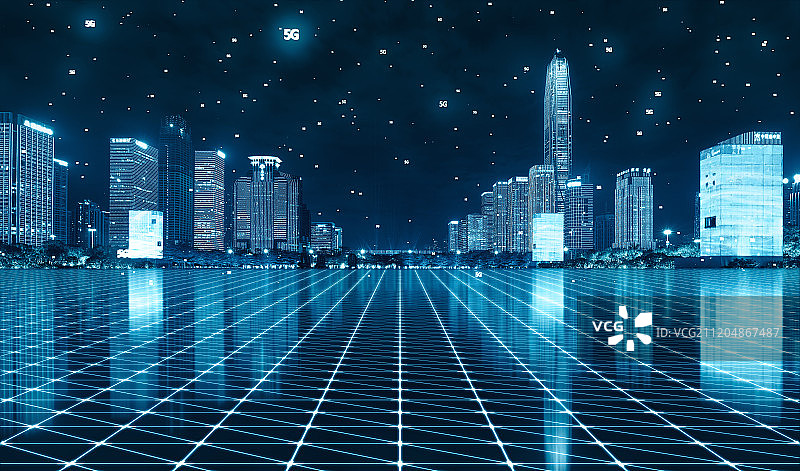 5G概念的深圳CBD摩天大楼夜景和科技感地面图片素材