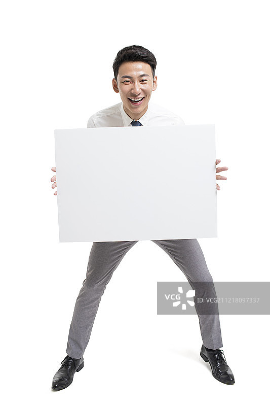 年轻商务男士展示白板图片素材