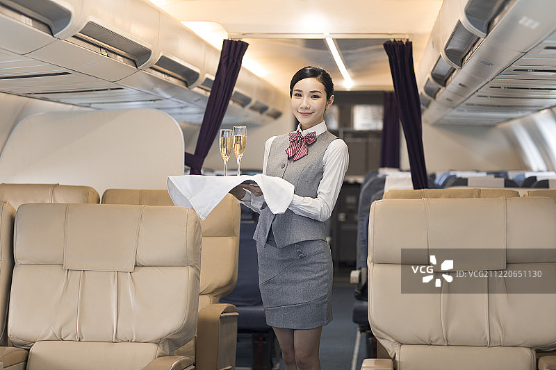 端着香槟的空姐图片素材