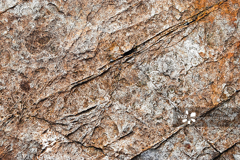 抽象的带凹槽的旧岩石图片素材