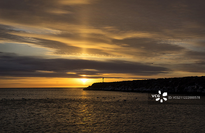 北部防波堤太阳尖塔图片素材
