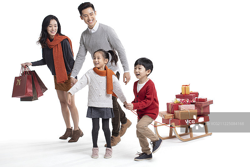 快乐年轻家庭与新年礼物图片素材