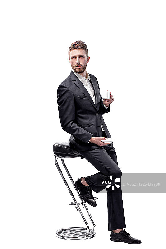 穿着优雅西装的英俊时尚男士肖像图片素材